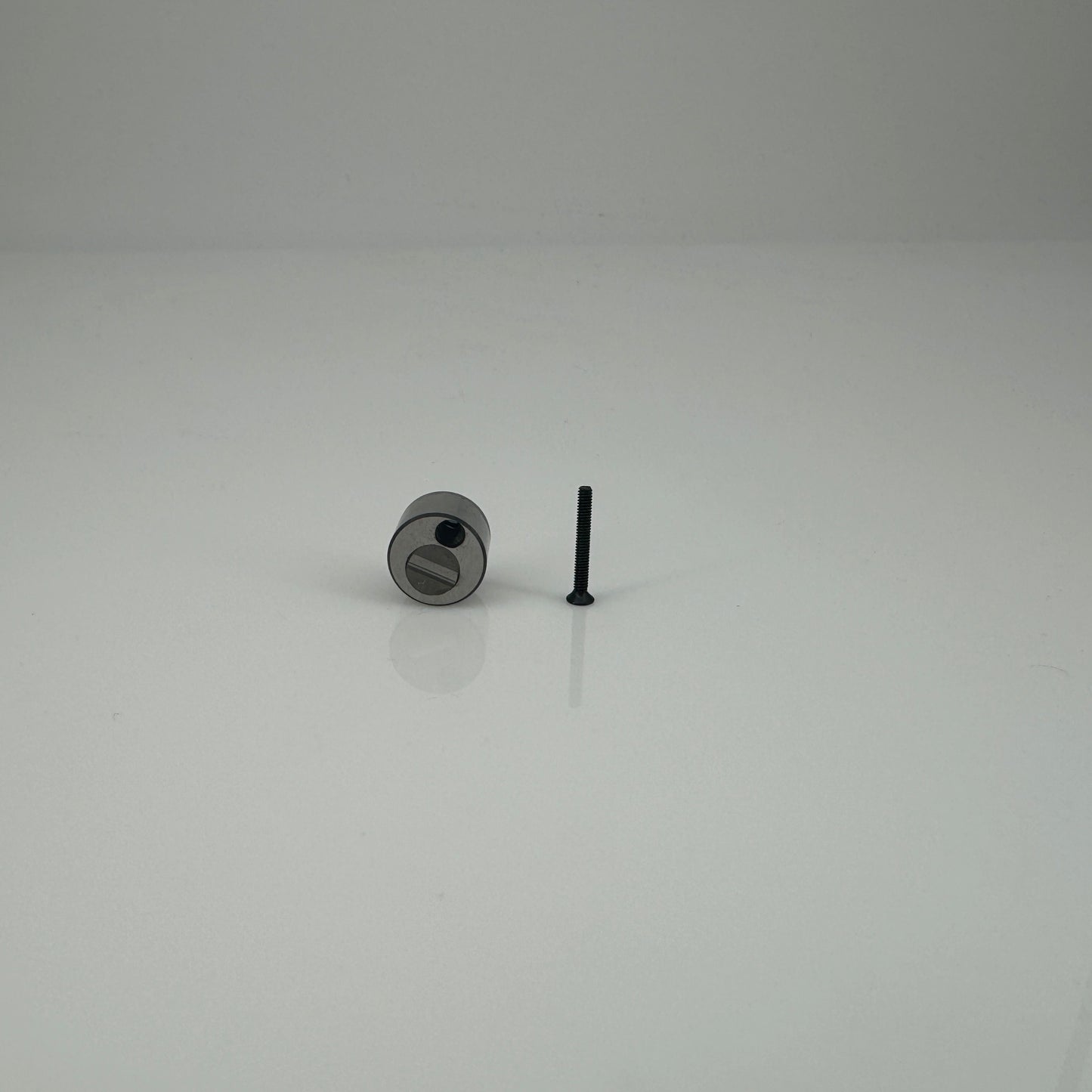 N103064 Dispositif de maintien de curseur avec boîtier rond